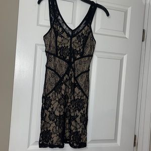 Nude with black lace mini dress